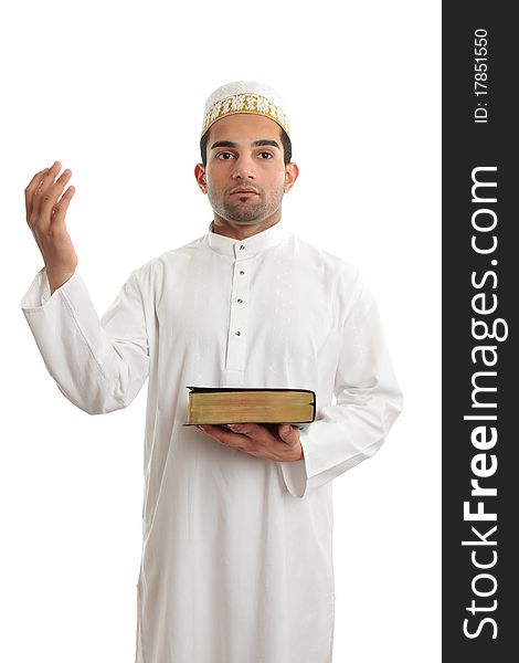 A man holding a holy book such as a bible or qur'an and hand raised in worship. White background. A man holding a holy book such as a bible or qur'an and hand raised in worship. White background.