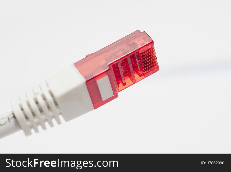 An image of computer network cable on white background