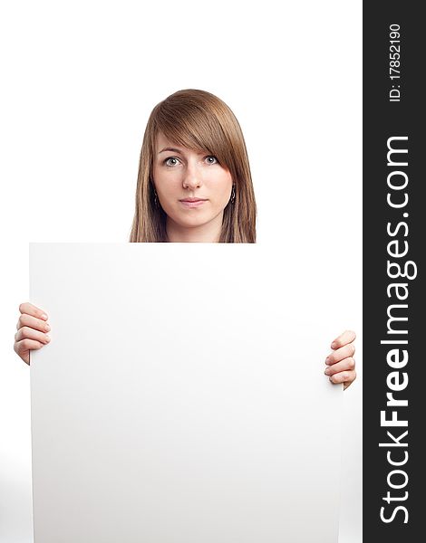 Attractive woman with blank sign. Smiling.