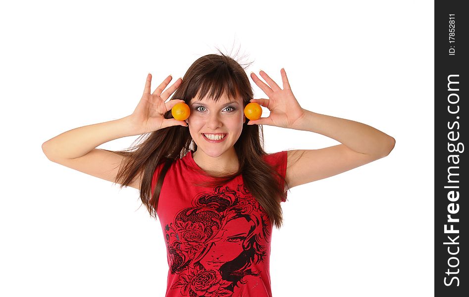 Smiling girl with tangerines. Isolated at white background