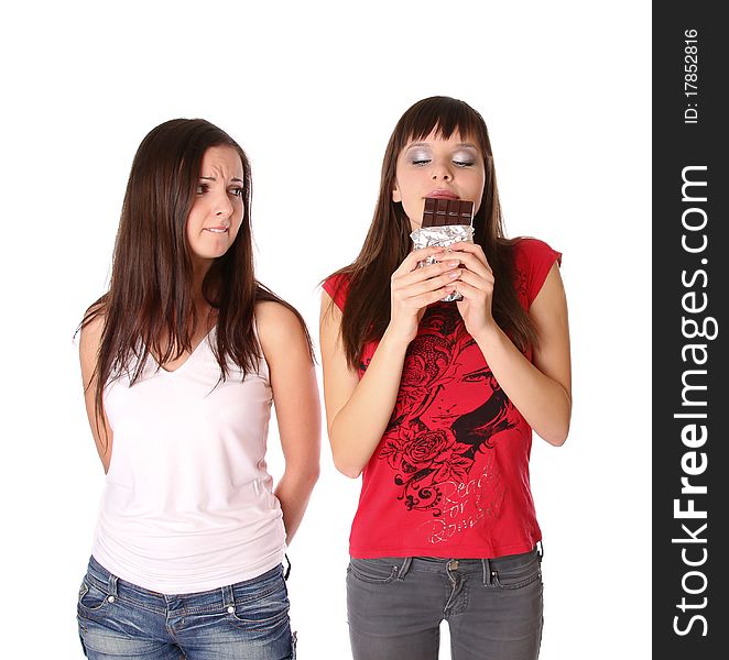 Two girls with chocolate. Isolated at white background