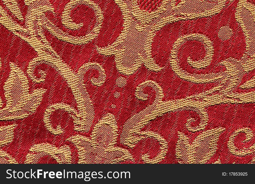 Red vintage fabric with gold decor