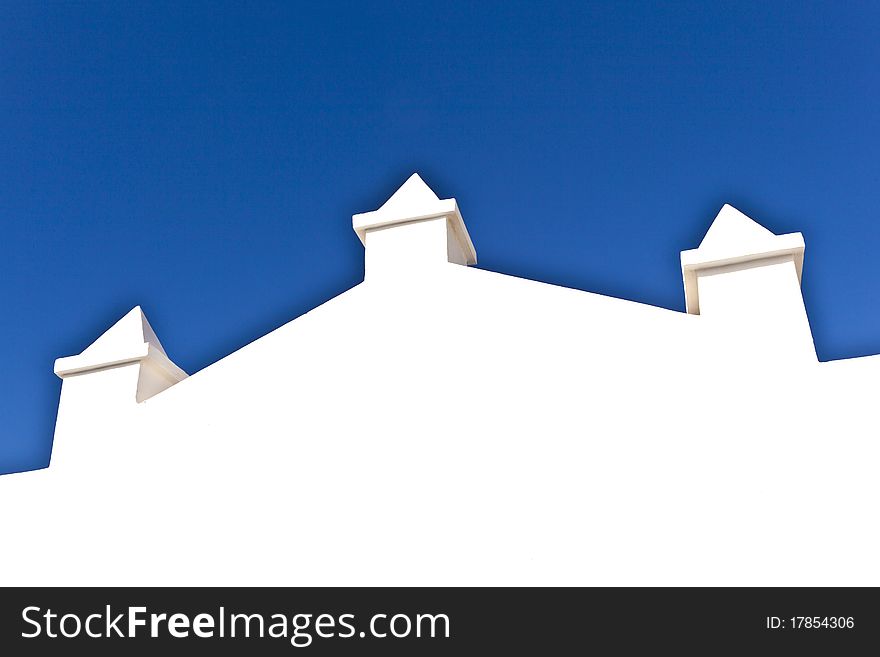 White Wall With Blue Sky