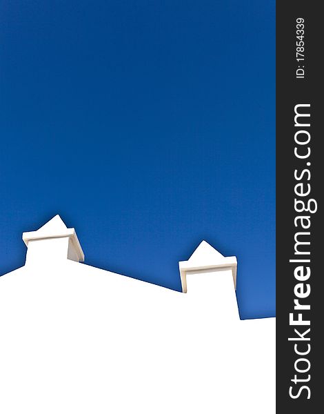 White wall with clear blue sky. White wall with clear blue sky