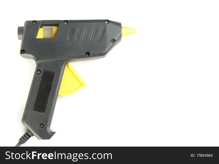 Glue pistol, is isolated on a white background