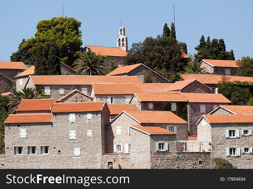 Roofs of old town in Montenegro. Hotel St. Stefan. Roofs of old town in Montenegro. Hotel St. Stefan