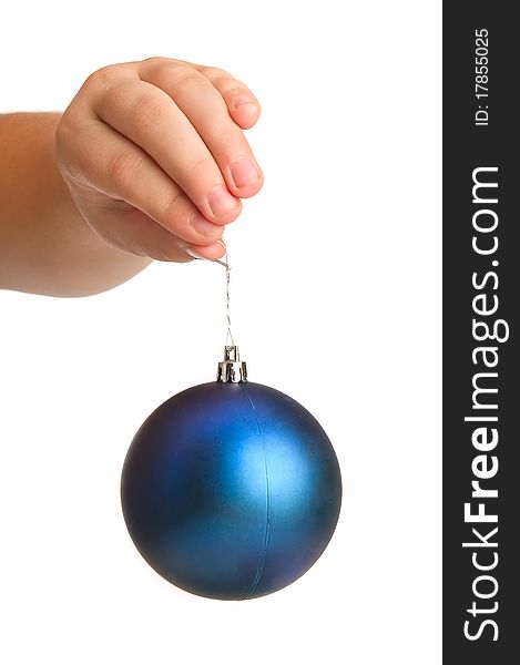 Blue christmass ball in child hand
