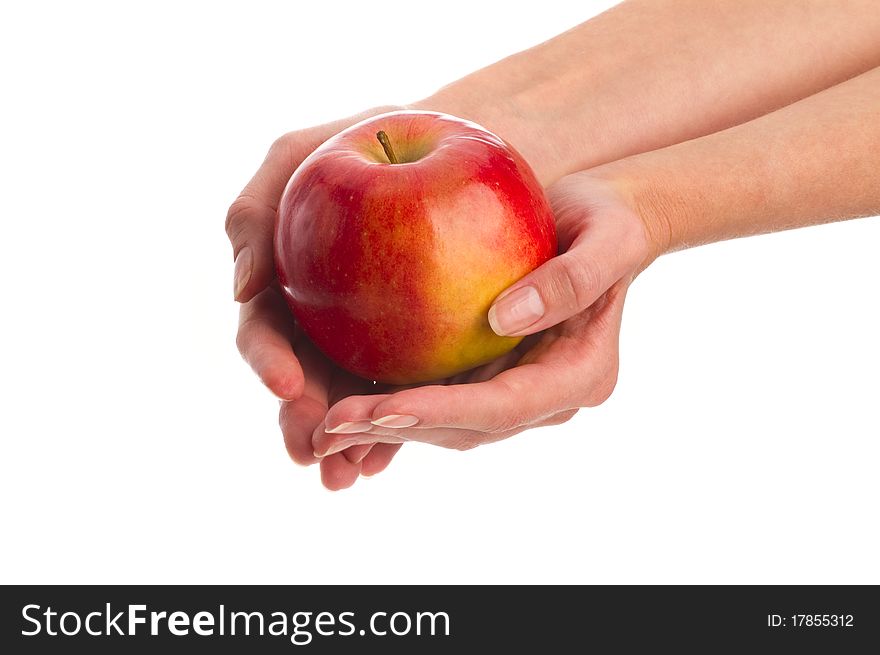 Apple in hands on white background