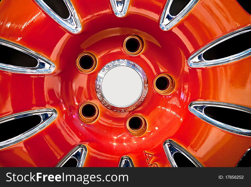 Red Metallic tyre disc of a sport car