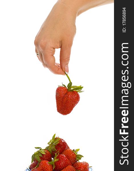 Strawberry in hands on white background isolated