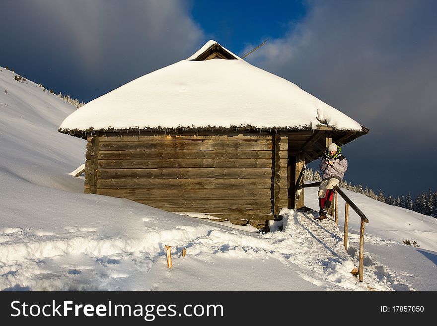 Hiker boy in winter in mountains