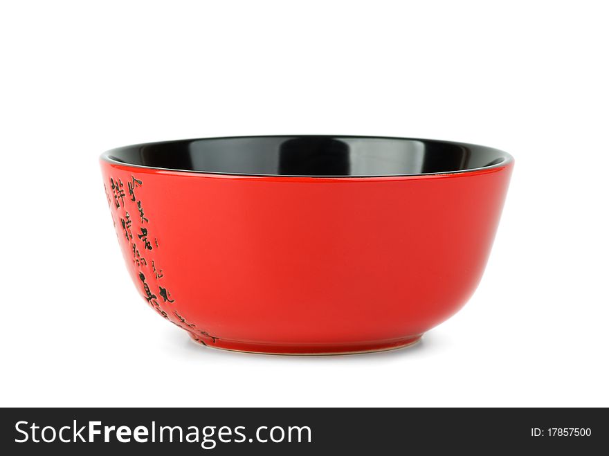 Empty red ceramic bowl isolated on the white background