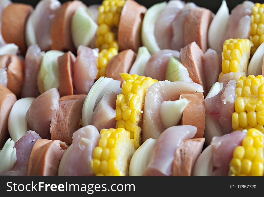Raw chicken and vegetable kabobs
