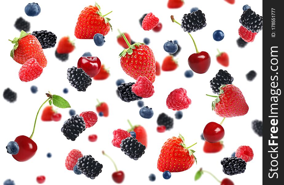 Set Of Falling Sweet Berries On Background