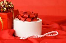 Box With A Gift On A Red Fabric Royalty Free Stock Photography Box With A Gift On A Red Fabric Royalty Free Stock Photography