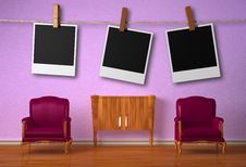 Two Chairs With Console And Hanging Frames Royalty Free Stock Photography Two Chairs With Console And Hanging Frames Royalty Free Stock Photography