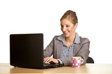 Woman In Suit Sitting At The Desk Stock Image