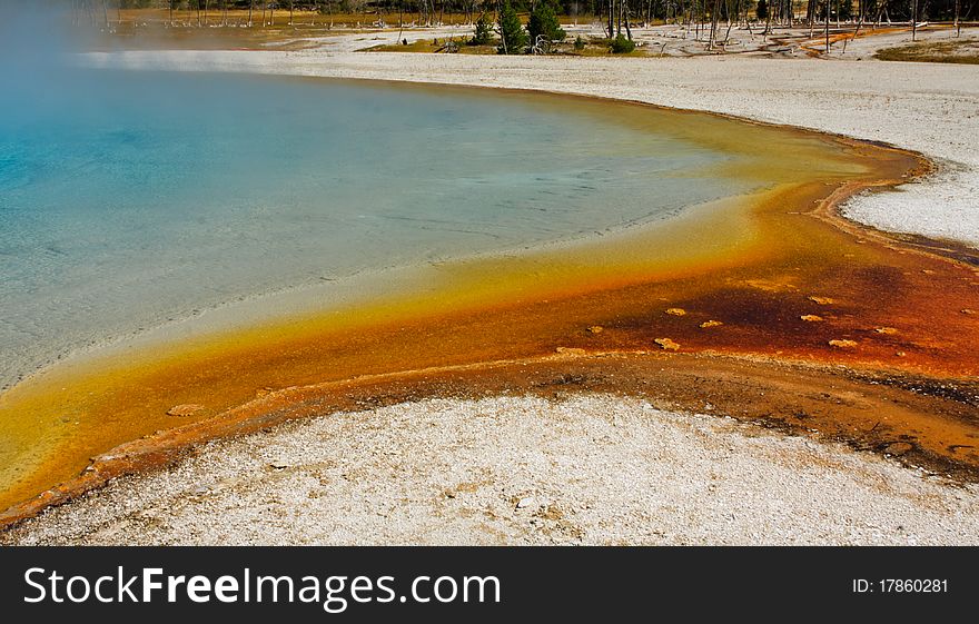 Sunset Lake hot spring showing brilliant blue, orange and red colors. Sunset Lake hot spring showing brilliant blue, orange and red colors.