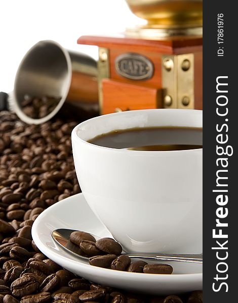 Cup Of Of Coffee And Beans On Isolated White