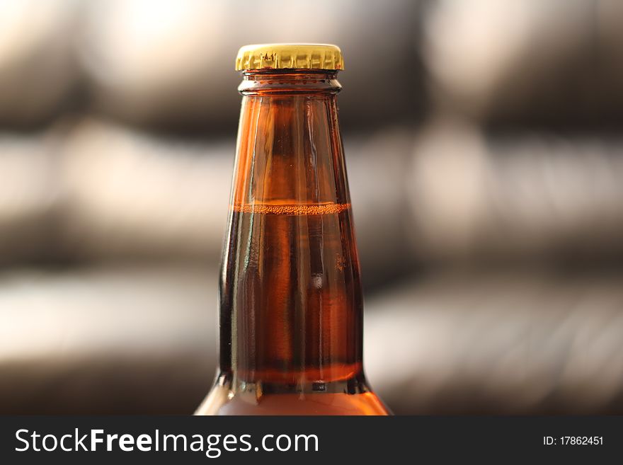 Close up of a beer bottles neck. Close up of a beer bottles neck