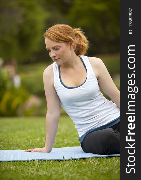 Young woman meditating yoga pose