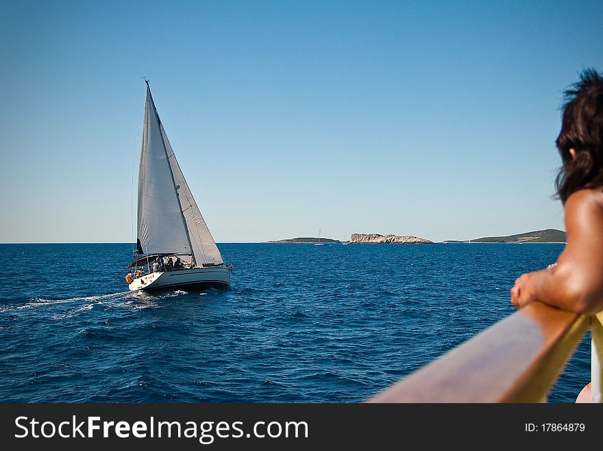 A sailboat in the beautiful waters of Croatia. A sailboat in the beautiful waters of Croatia