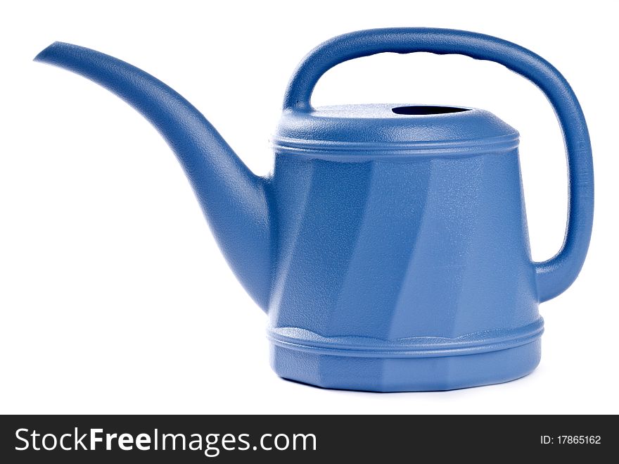 Blue plastic watering can isolated on white. Blue plastic watering can isolated on white.