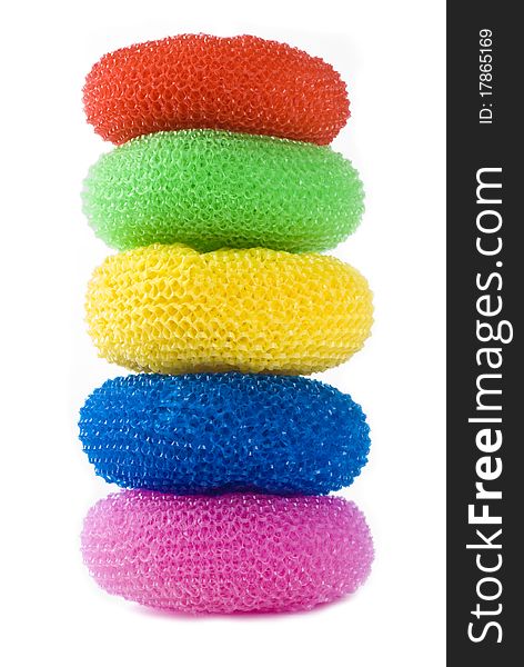 Stack of multi-colored scouring pads isolated on white. Stack of multi-colored scouring pads isolated on white.