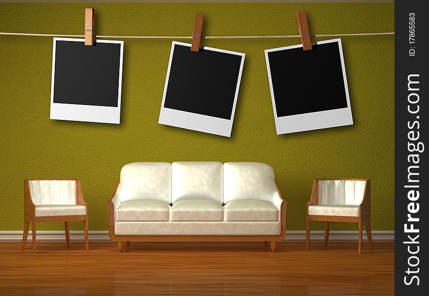 White couch and two chairs and hanging frames