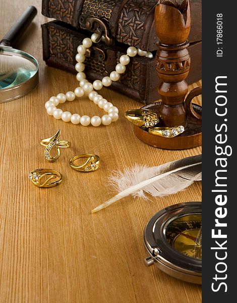 Old fashioned jewels and feather