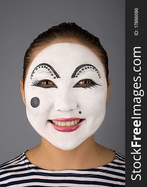 Smiling Asian Mime Looking To The Camera