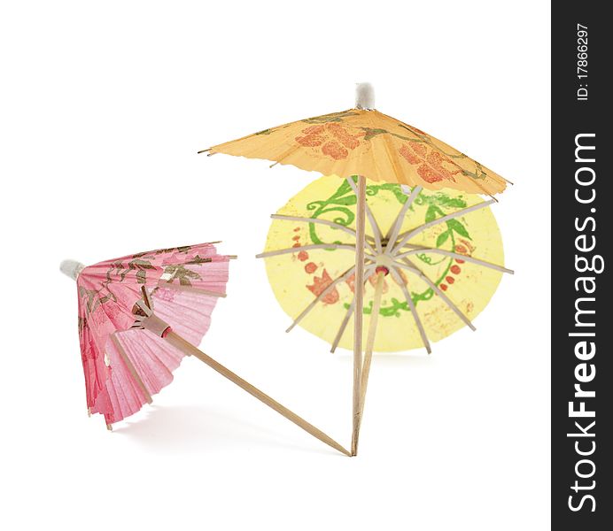 Umbrellas for cocktails on a white background