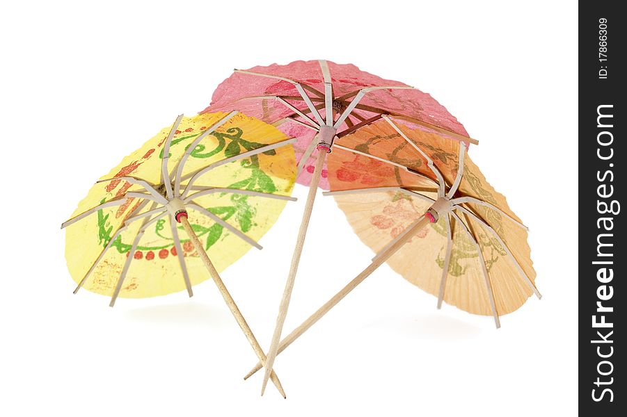 Umbrellas for cocktails on a white background