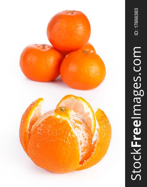 Sliced and whole orange, isolated on white