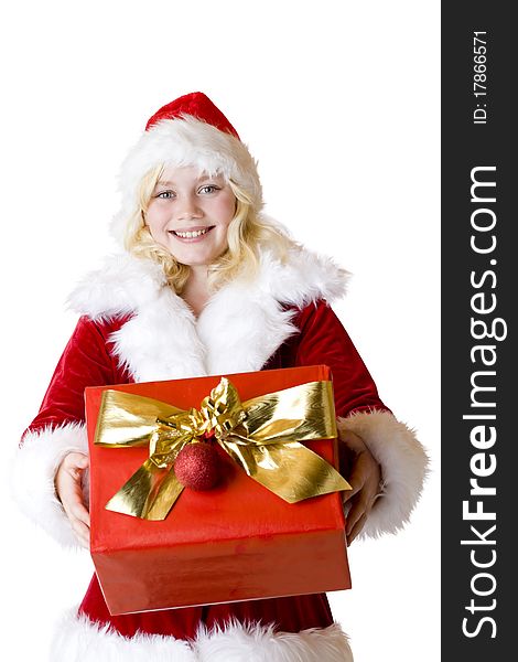 Young girl with christmas present smiles happy