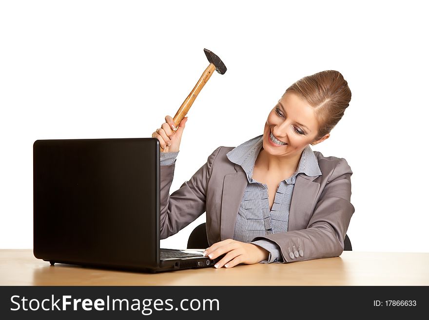 Woman in suit sitting at the desk