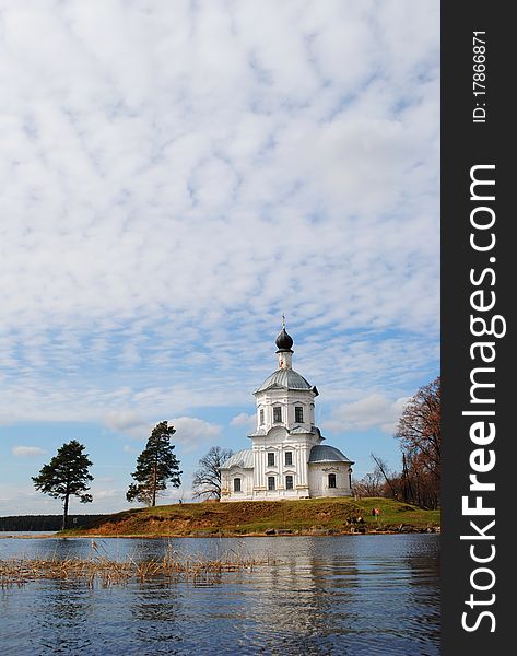 Church and island on lake Seliger in the spring