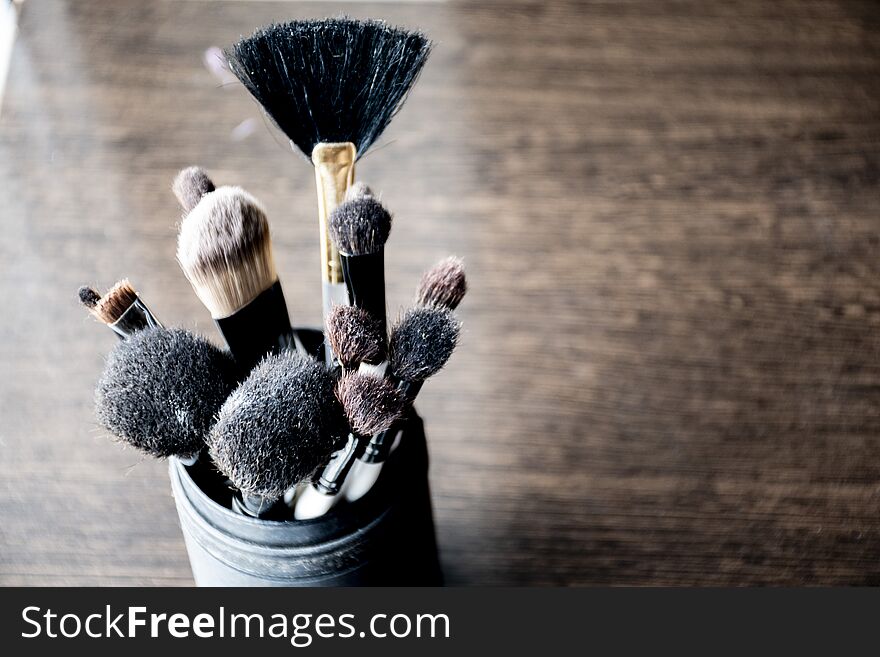 Set of different types of makeup brushes, cosmetic things, face care concept. Set of different types of makeup brushes, cosmetic things, face care concept.