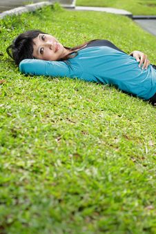 Young Beautiful Girl Smiling And Lying Down Stock Photos Young Beautiful Girl Smiling And Lying Down Stock Photos