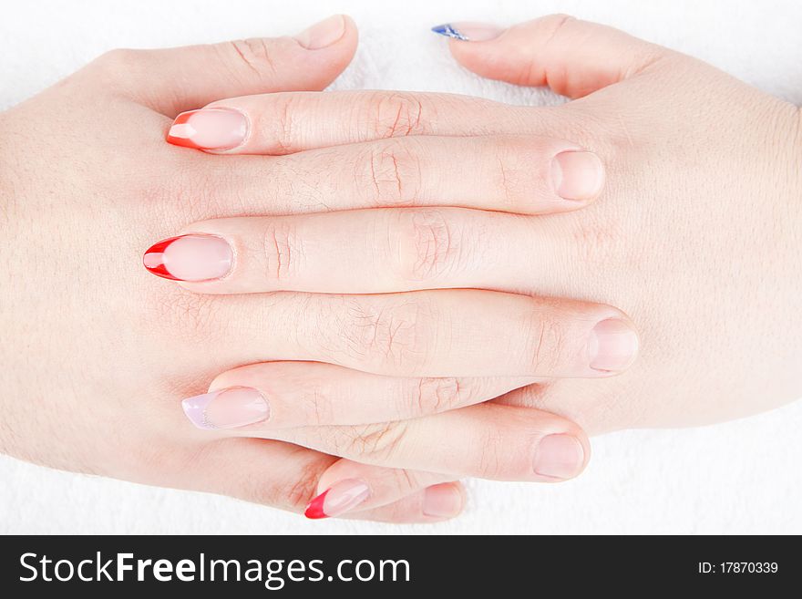 Beautiful woman's hands are doing the male manicure