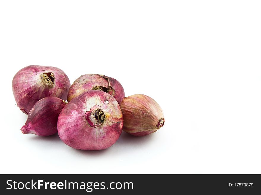 Group of red shallot isolated on white background