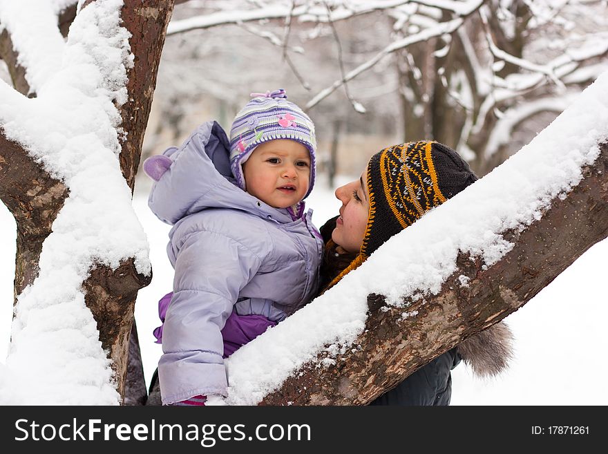 Mother and daughter outdoor in winter. Mother and daughter outdoor in winter