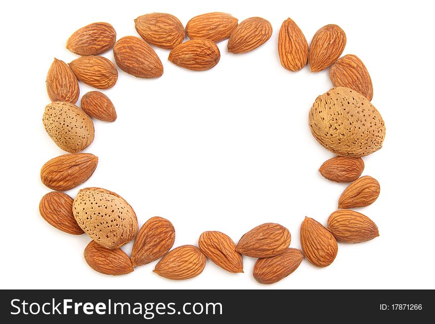 Frame formed from delicious fresh almond nuts. Frame formed from delicious fresh almond nuts