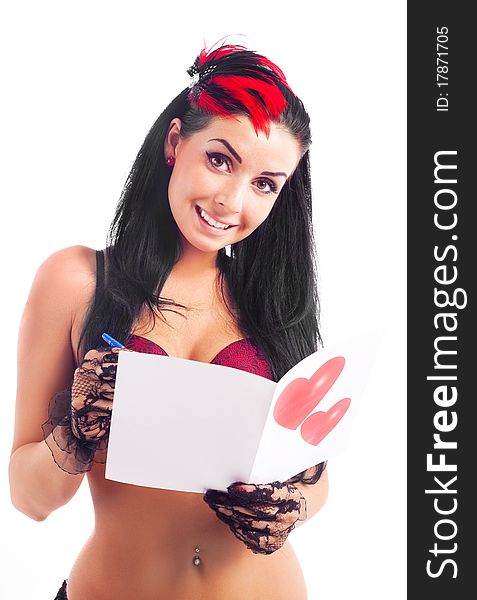 young brunette woman with a Valentine's card in her hands. young brunette woman with a Valentine's card in her hands