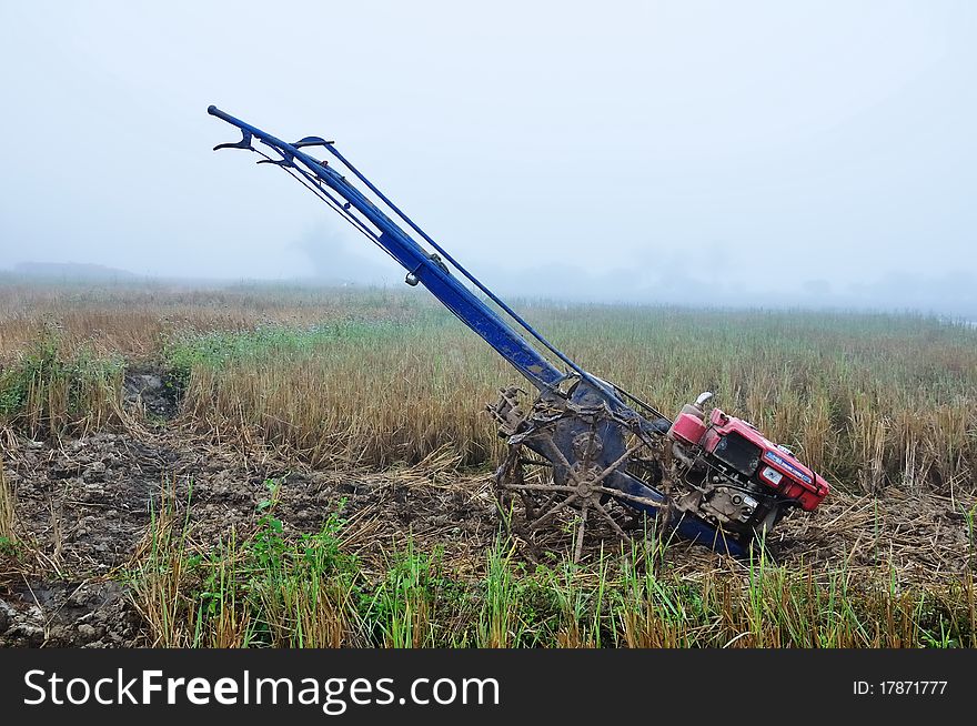 Tractor is prepared to work in the morning at a farm in Wiang Pa Pao district. Tractor is prepared to work in the morning at a farm in Wiang Pa Pao district.