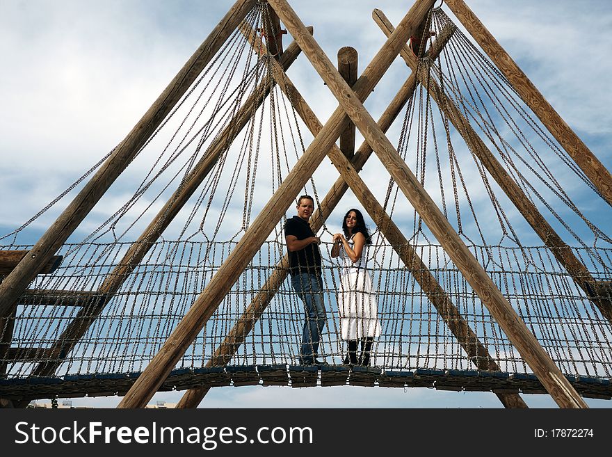 Couple on a wood bridge