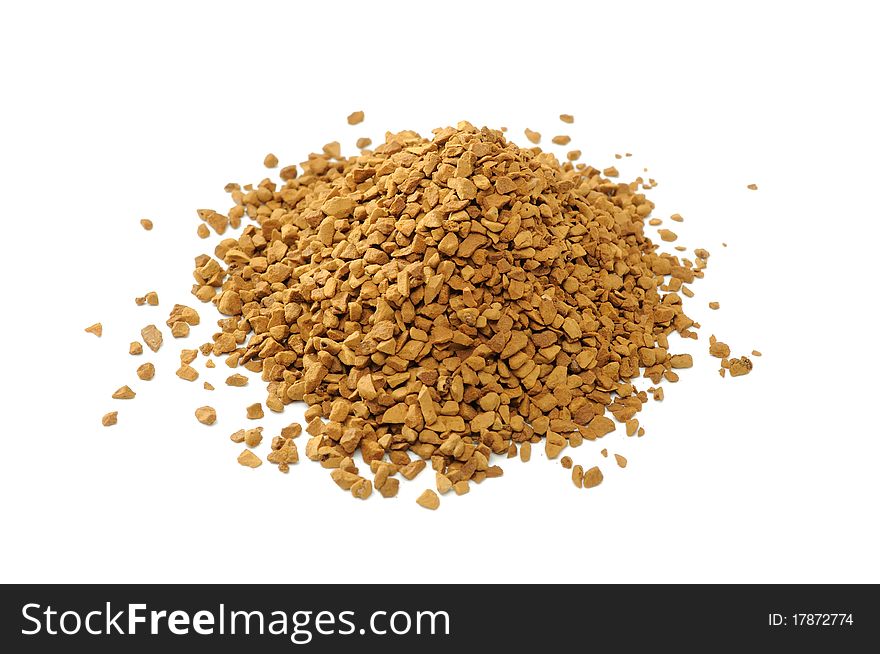 A pile of granulated instant coffee isolated on a white background