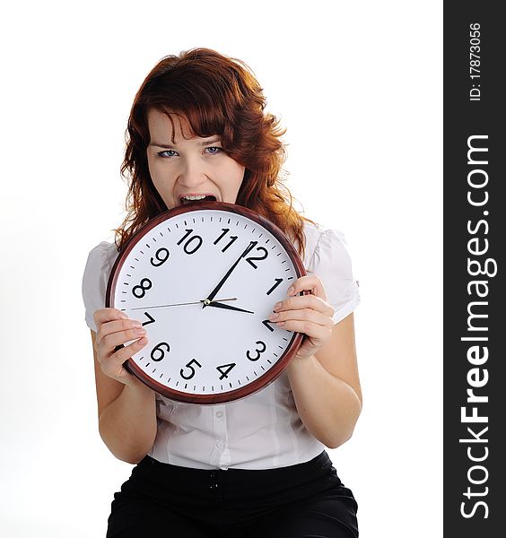 An image of a woman biting a big clock. An image of a woman biting a big clock