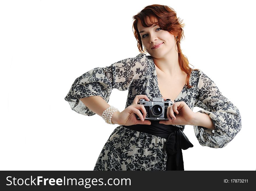 An image of a young woman with a camera. An image of a young woman with a camera