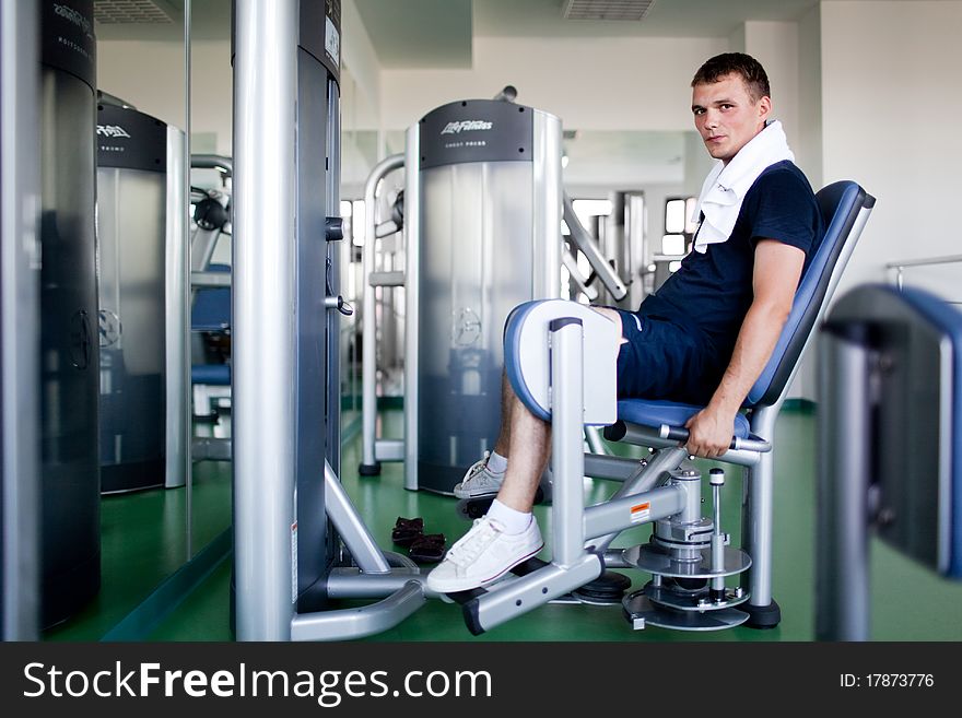 Healthy young man in a sport center. Healthy young man in a sport center